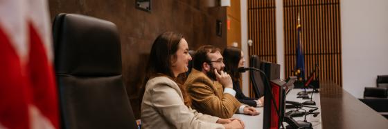 Students sitting in court room bench